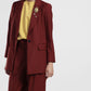 Blazer a righe con chiusura monopetto e spille