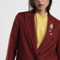 Blazer a righe con chiusura monopetto e spille
