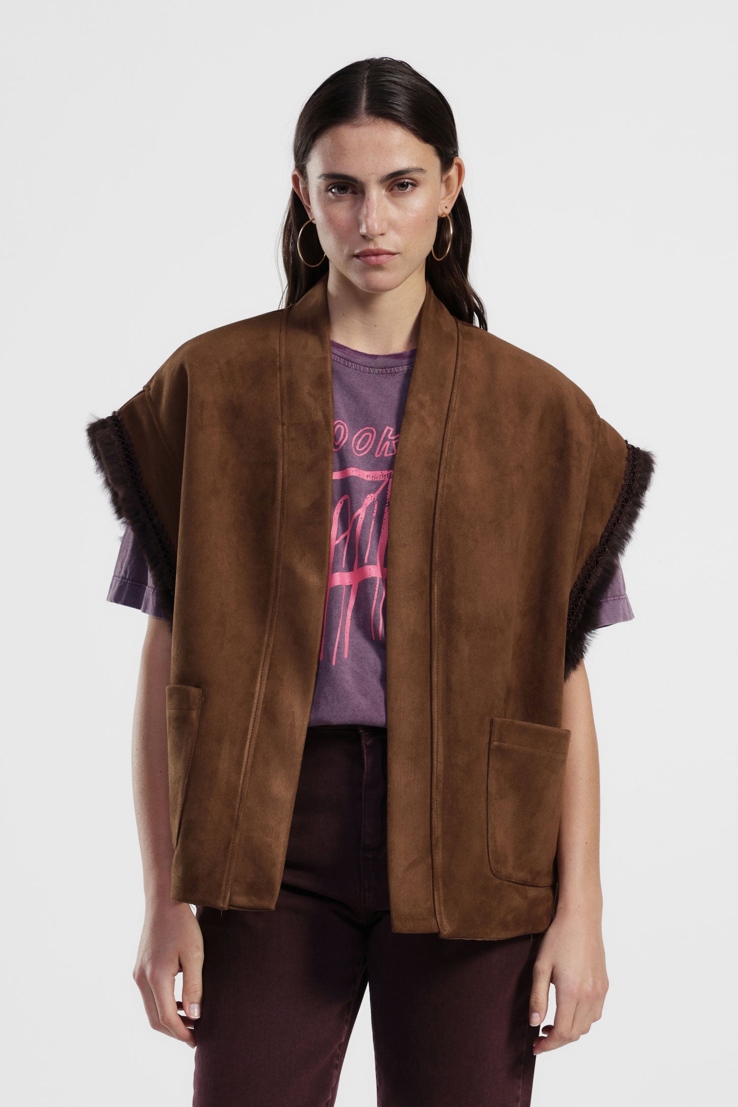 Gilet senza maniche con tasche applicate