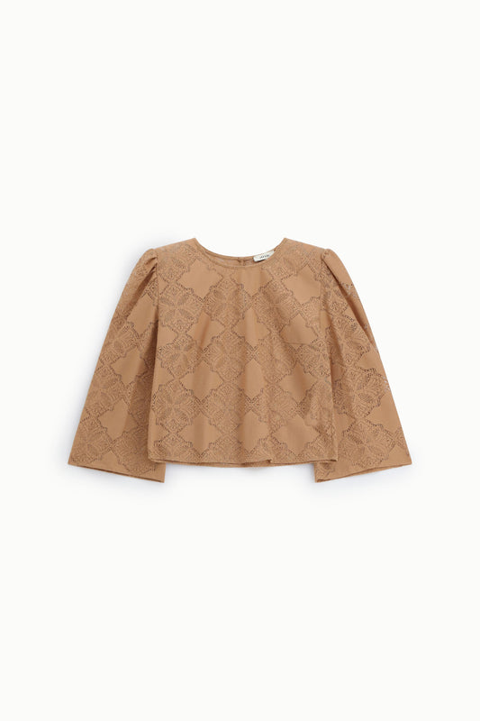 Top a maniche lunghe con ricamo geometrico