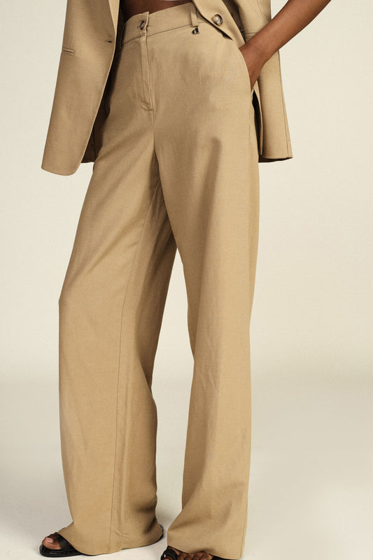 Pantaloni palazzo con tasche laterali e vita elasticizzata