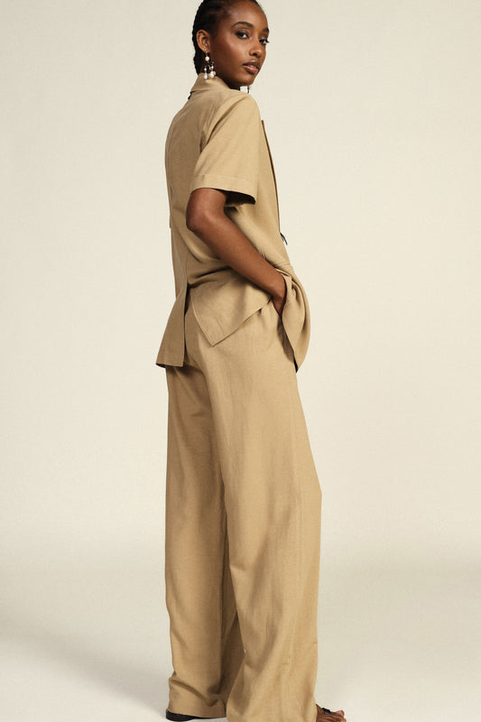 Pantaloni palazzo con tasche laterali e vita elasticizzata
