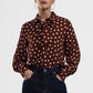 Camicia a pois con fiocco decorativo
