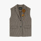 Gilet con fiori e bottoni