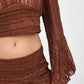 Top a righe con maniche lunghe