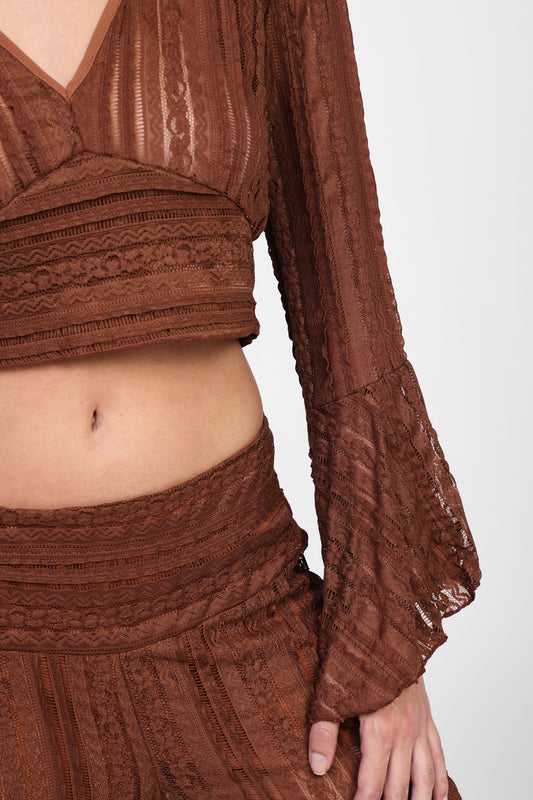 Top a righe con maniche lunghe
