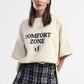 T-shirt ampia con stampa testo