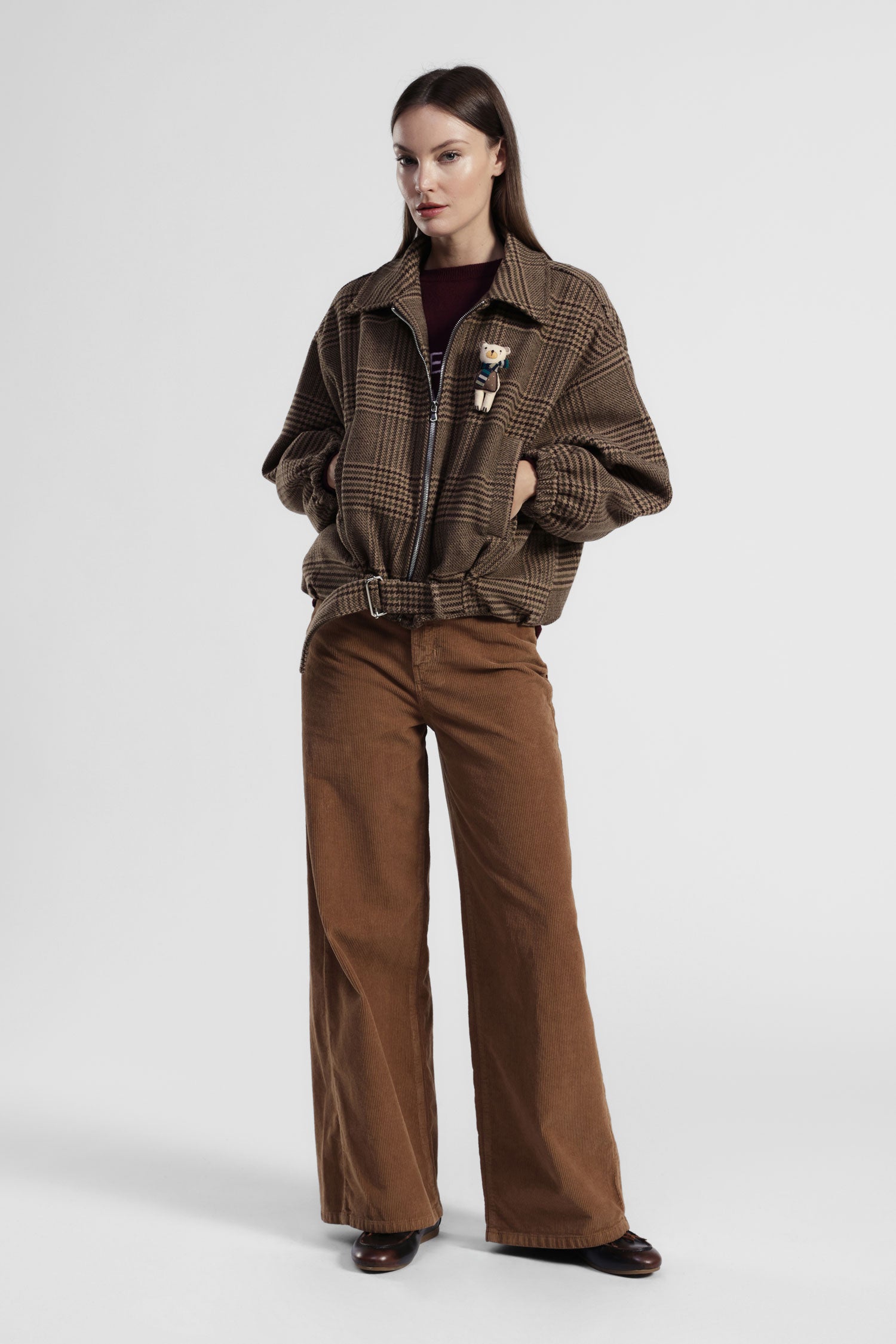 Pantaloni palazzo a costine con vita alta e tasche