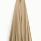 Jumpsuit con collo halter e taglio ampio