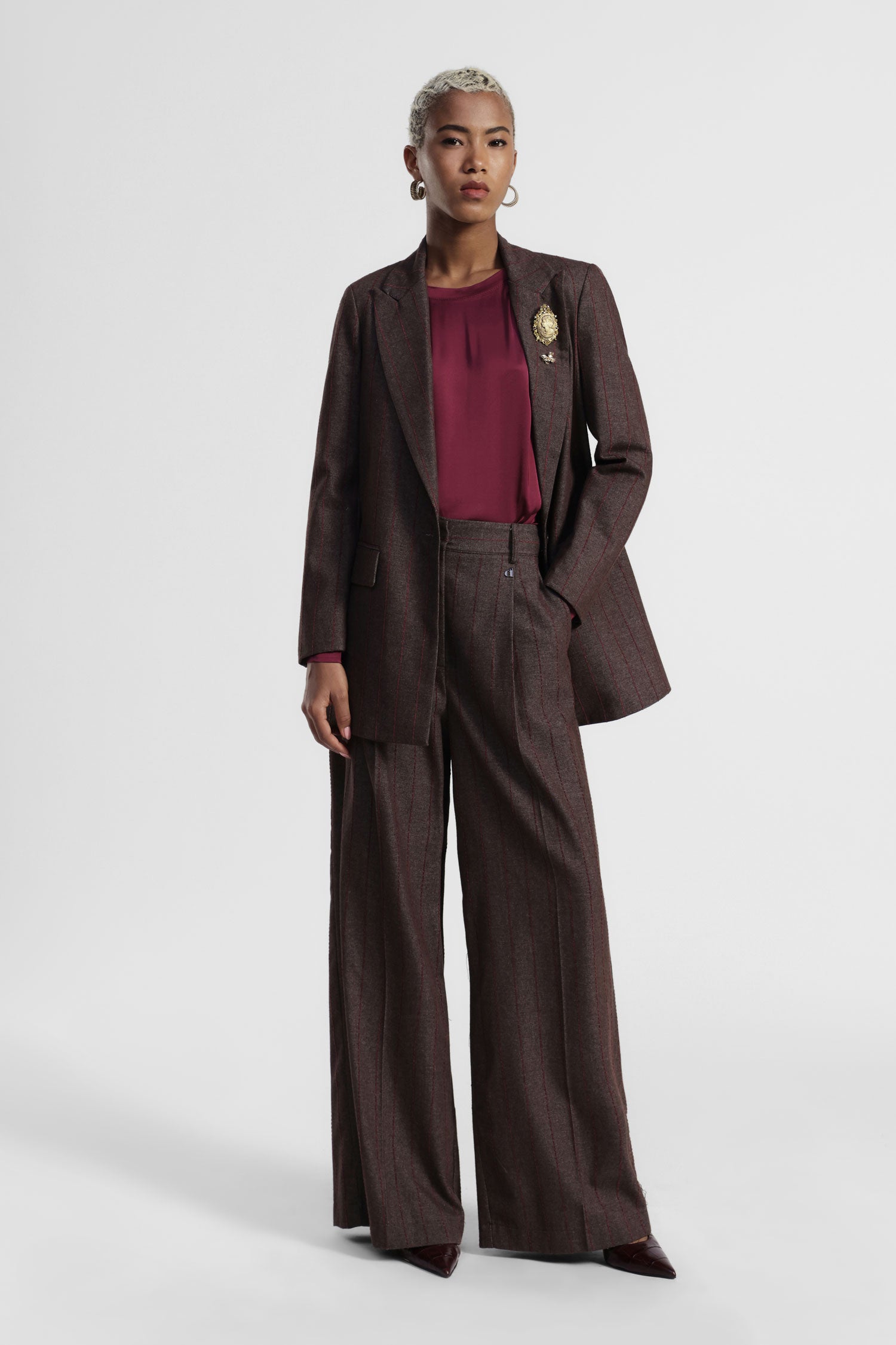 Pantaloni palazzo a righe con pinces e tasche