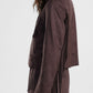 Blazer con frange, zip frontale e tasche