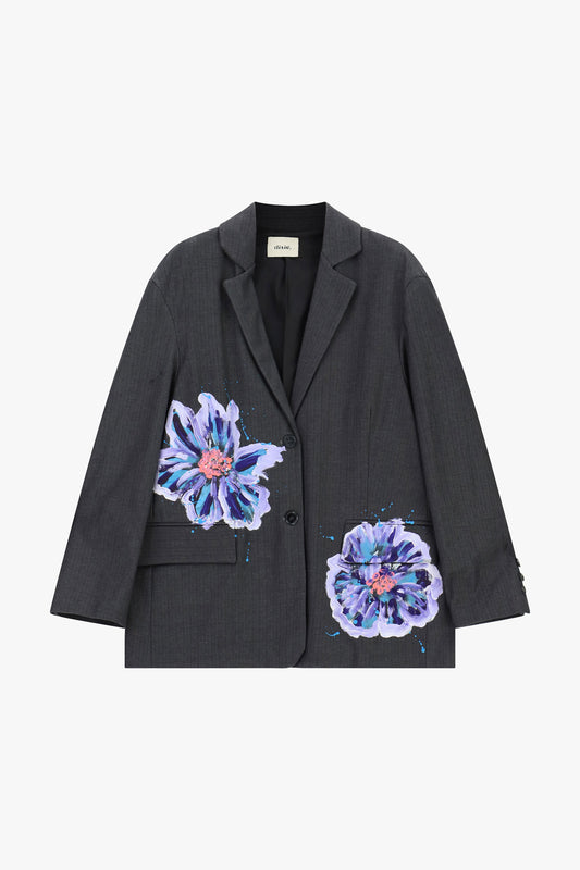 Blazer con grandi fiori dipinti e tasche frontali
