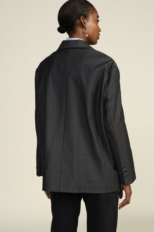 Blazer con grandi fiori dipinti e tasche frontali