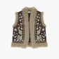 Gilet smanicato con ricamo floreale e profili pelosi