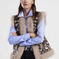 Gilet smanicato con ricamo floreale e profili pelosi