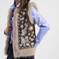 Gilet smanicato con ricamo floreale e profili pelosi