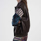 Giacca smanicata con maxi tasche frontali