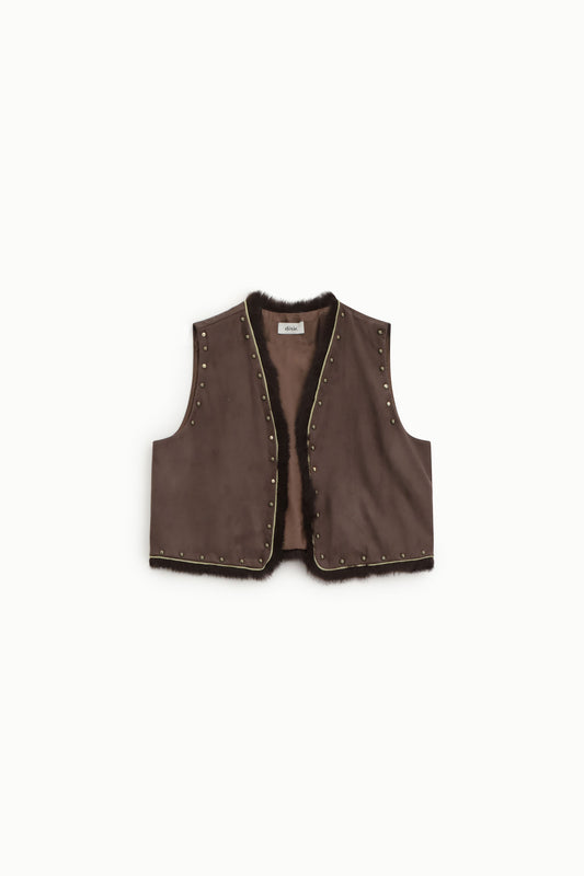 Gilet corto con borchie e bordo a contrasto