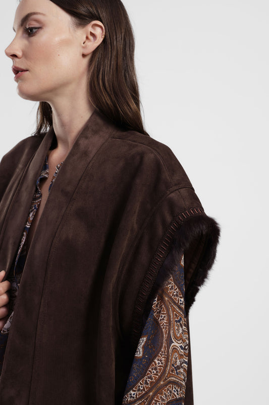 Gilet senza maniche con tasche applicate