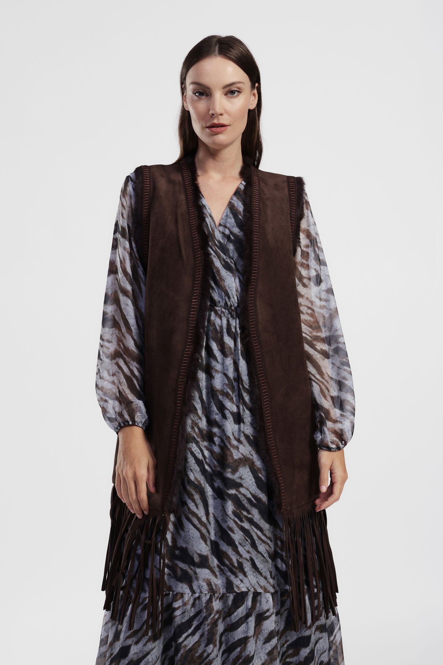 Cappotto smanicato con frange lunghe