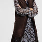 Cappotto smanicato con frange lunghe