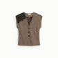 Gilet fantasia spigata con inserto pizzo