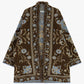 Cappa jacquard con motivo floreale frange