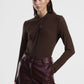 Maglia con drappeggio e collo alto