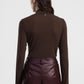 Maglia con drappeggio e collo alto