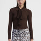 Maglia con fiocco e maniche lunghe