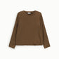 Top a manica lunga con scollo rotondo