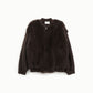 Eco-fur con zip e maniche a sbuffo