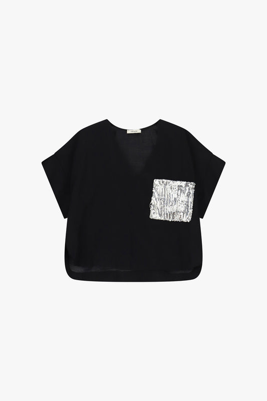 Blusa corta con tasca applicata a paillettes