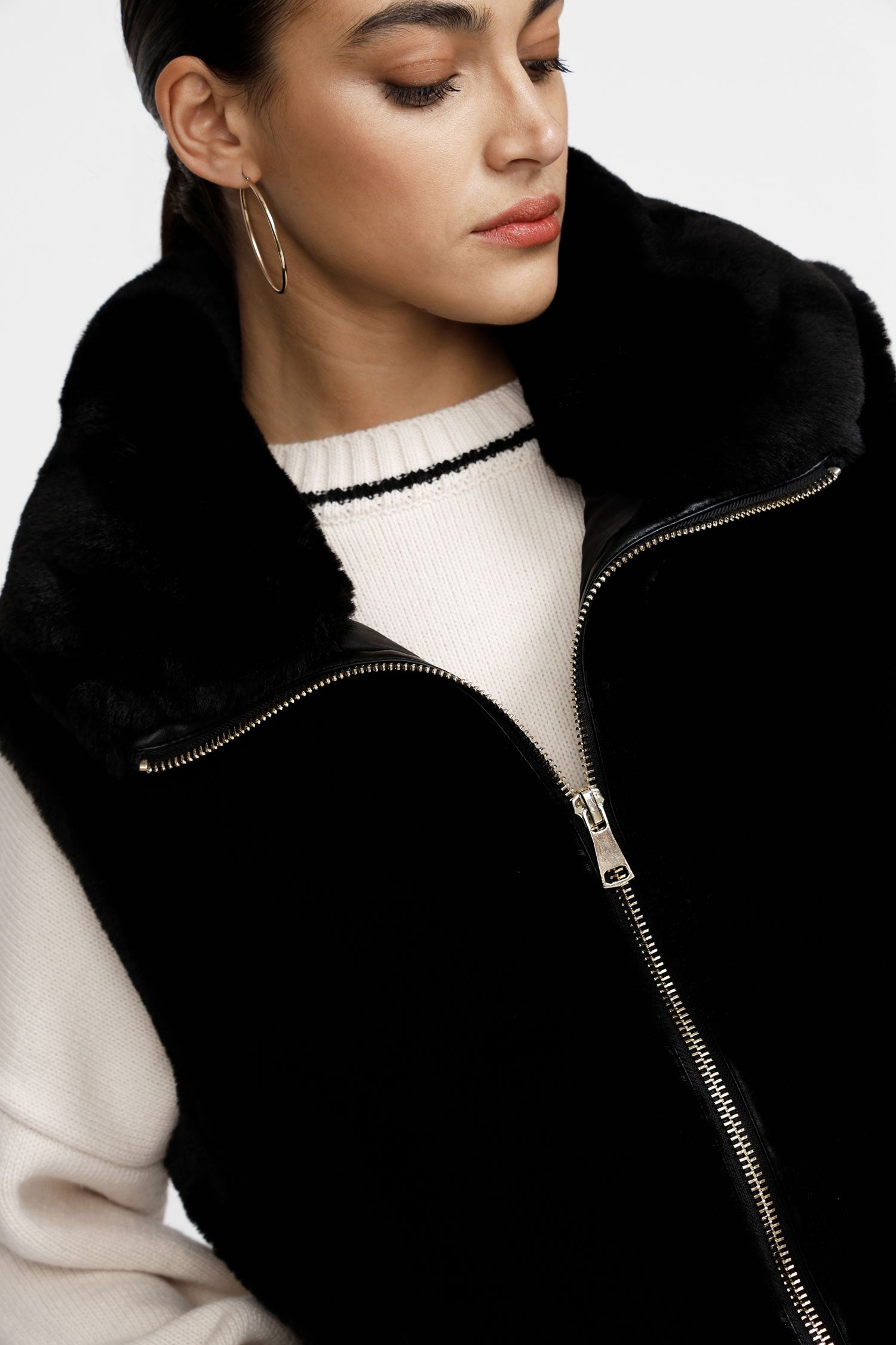 Gilet con cerniera e tasche laterali