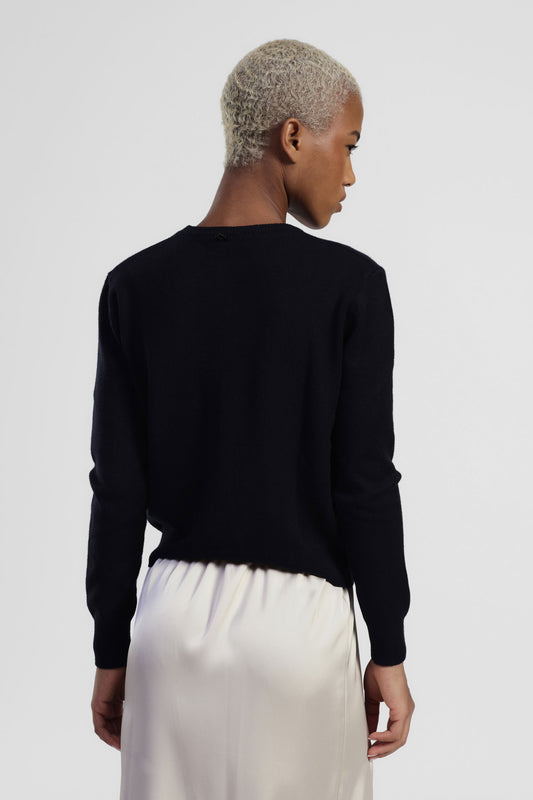 Maglione decorato con applicazioni floreali