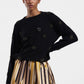 Pullover girocollo con applicazioni