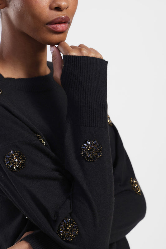 Pullover girocollo con applicazioni