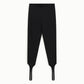 Trousers slim fit con staffe alla caviglia