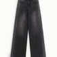 Jeans a gamba ampia con applicazioni decorative