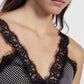 Top a pois con scollo a v e pizzo