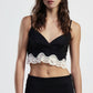 Top corto con scollo a v e bordo in pizzo