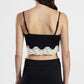 Top corto con scollo a v e bordo in pizzo