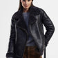 Giacca in eco-pelliccia con zip laterale