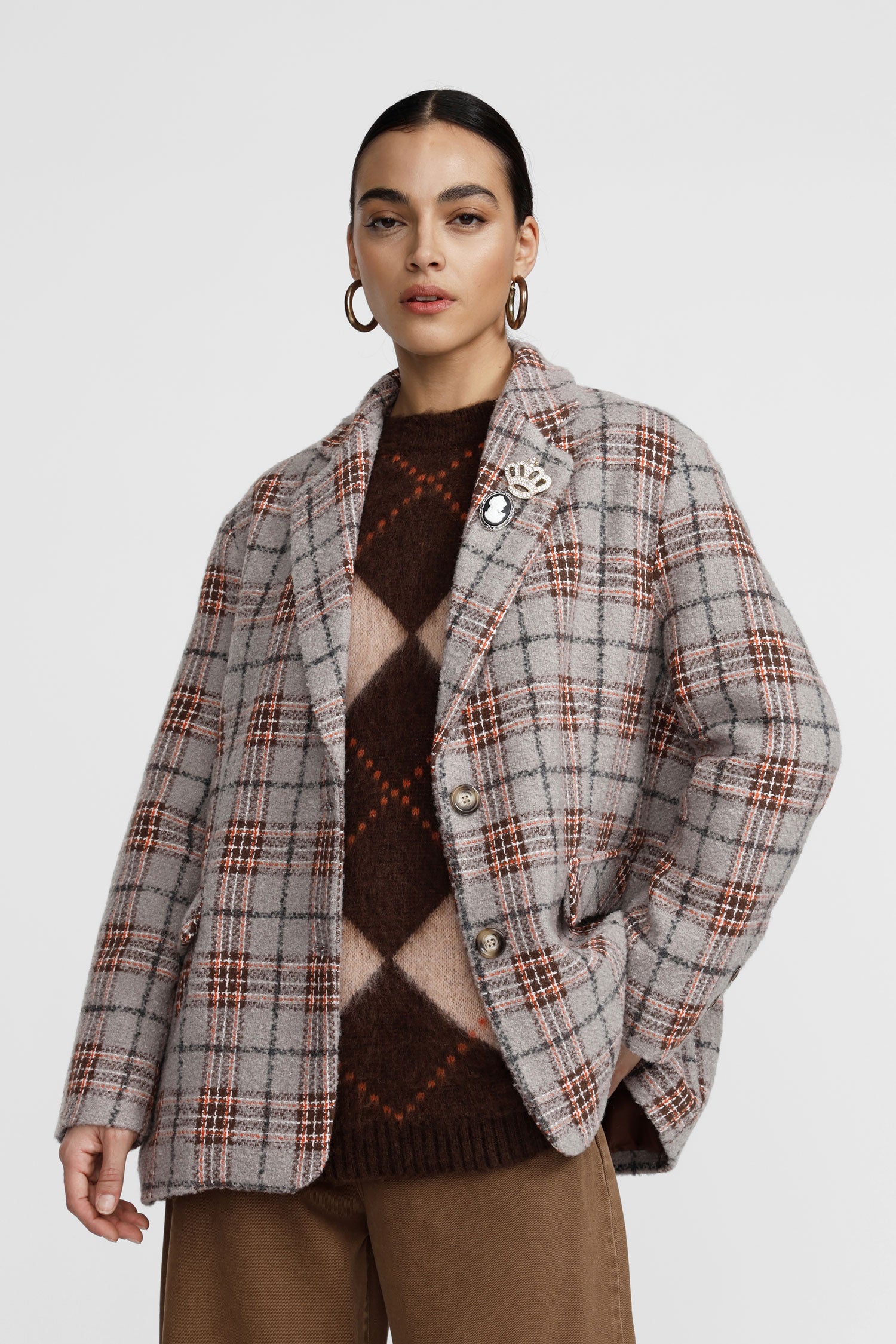 Blazer a quadri con chiusura a bottoni singoli