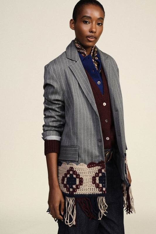 Blazer a righe con inserti crochet e frange