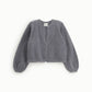 Cardigan corto con maniche ampie e v-neck