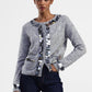 Cardigan con paillettes e tasche