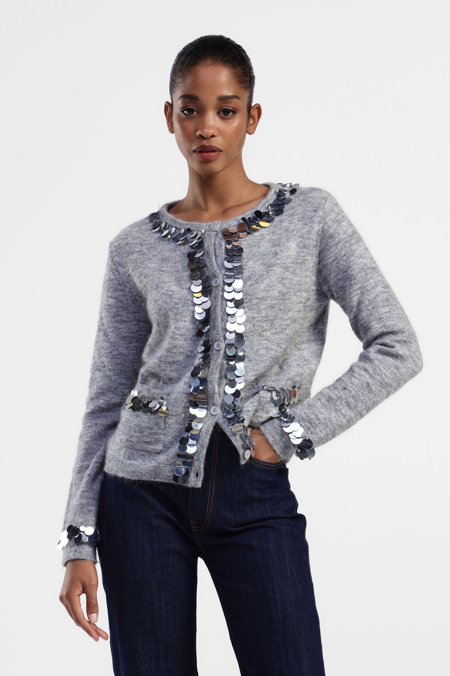 Cardigan con paillettes e tasche