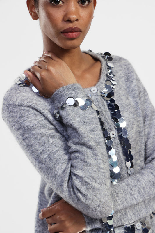 Cardigan con paillettes e tasche