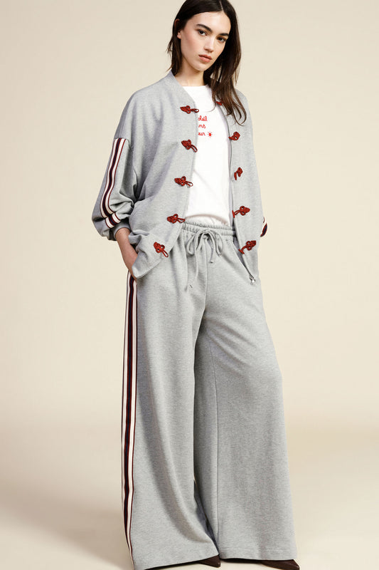 Pantaloni palazzo a vita alta con bande laterali